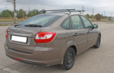 Багажники АЭРО с креплением в штатные места (1200 мм, черные) для а/м Лада Гранта седан (2011- ), Лада Гранта хэтчбек (2018- ), Лада Гранта лифтбек (2014- ) (2070-02-А12-1-02)